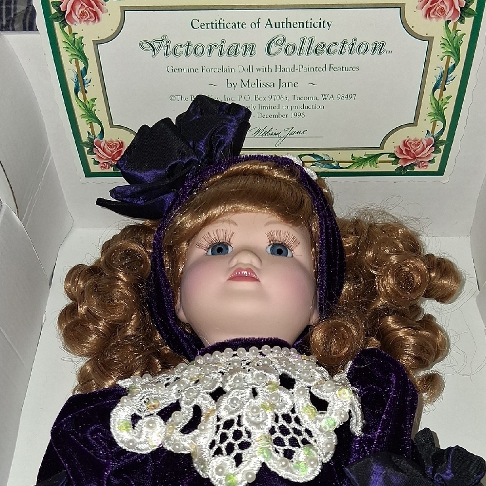 Porcelain Doll with Purple Dress